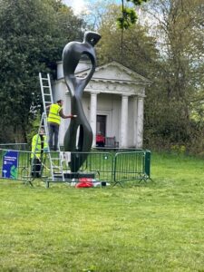 A Henry Moore sculpture being polished